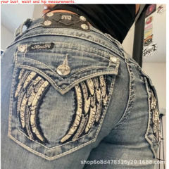 国境を越えた対外貿易春秋の新型レトロな刺繍にジーンズを入れるファッションの流行がゆるいカジュアルなストレートパンツ