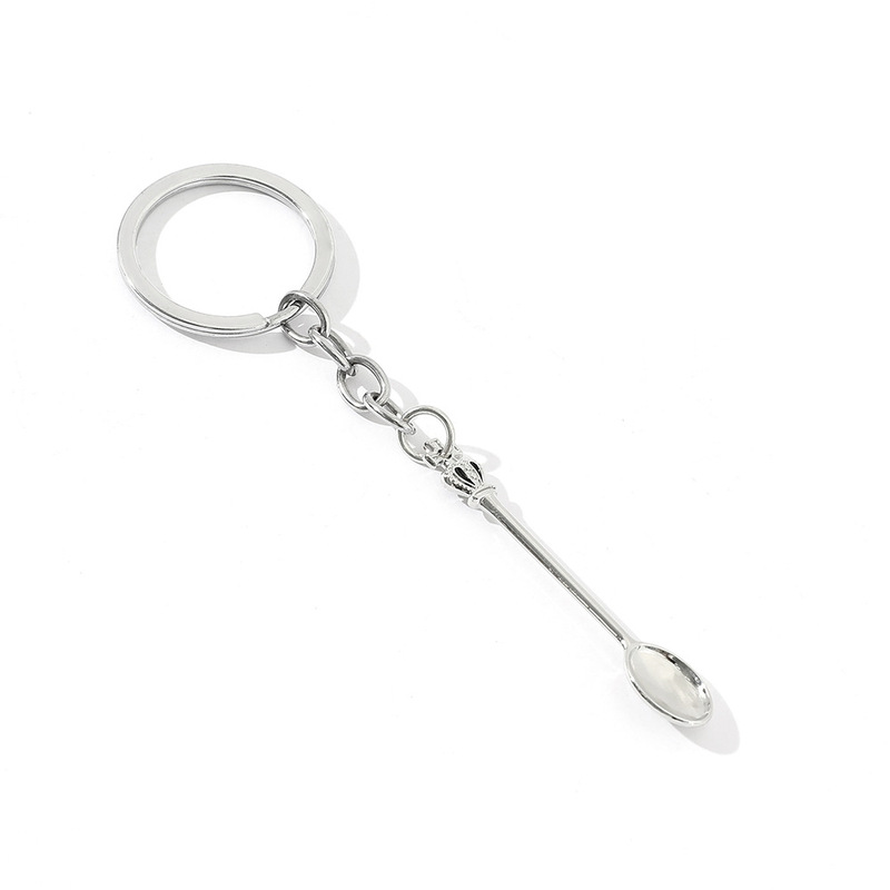 Cross-border Alice in Wonderland Couple Keychain Pendant European and American Movie Peripheral Gifts Hot Sale