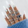 Cross -border jewelry 15 -piece rings Personalized tide Fan Hollow Lotus Flower Geometric Black Gem Set Ring