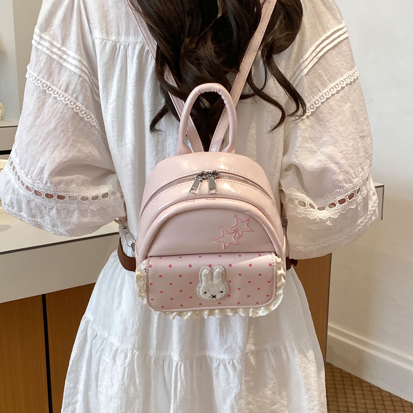 Cute conejo mini ultrafuego 2026 mochila de alta belleza mochila de mujer versátil tarjeta de verano de la escuela de aire nuevo