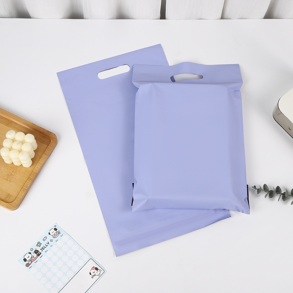 Bolsa de entrega rosa portátil, bolsa de embalaje de color de ropa PE gruesa, bolsa de transporte ecológico de gran capacidad, bolsa impermeable