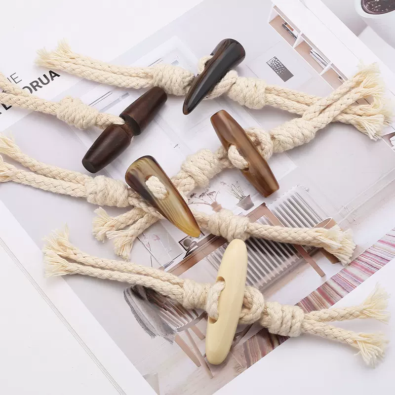 工厂批发麻绳牛角对扣冬季大衣风衣棉绳羊角童装橄榄毛衣纽扣