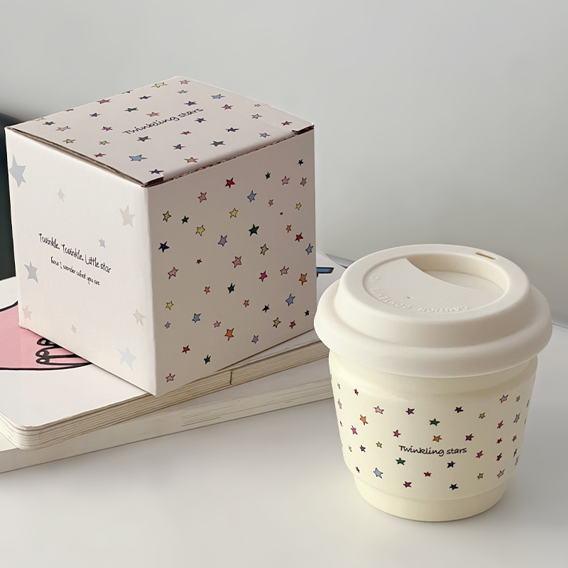 Taza de café de cerámica macaron de alto valor creativo de la serie de tazas de desayuno portátiles de mano Starins simple