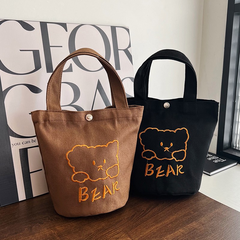Personalized ladies' bucket bag, versatile and cute canvas bear wholesale, simple Japanese style new handbag undefined
