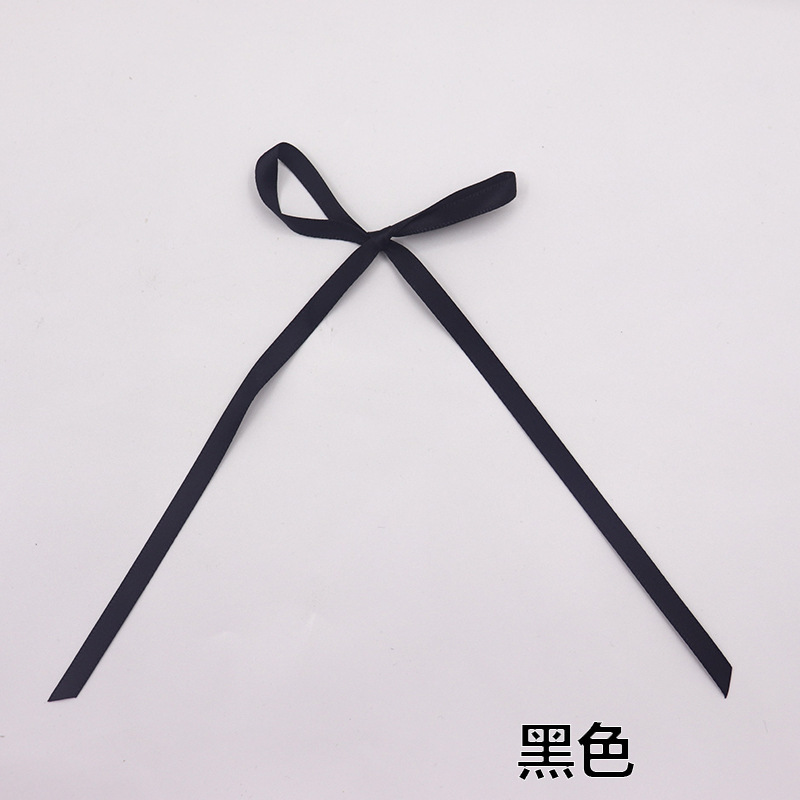 現物の0.6センチの幅の長いリボンの蝶結びの諸及びネットの赤い靴下の蝶結びの部品の服装の補助材料|undefined