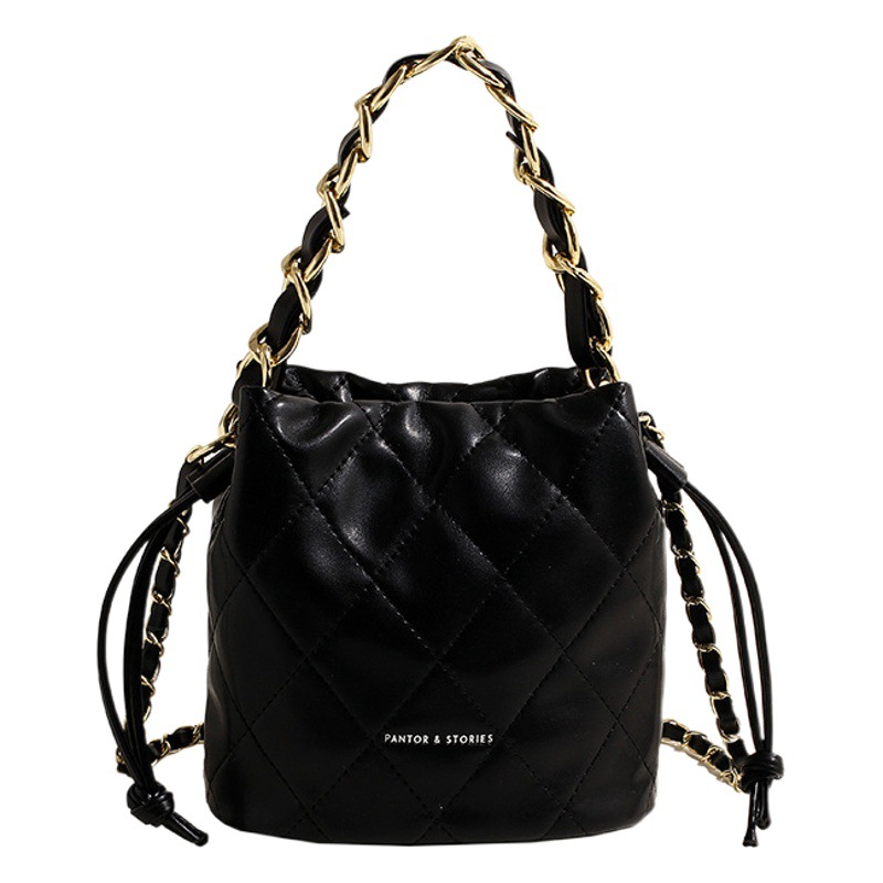 Bolso de las mujeres 2024 primavera nueva cadena de diamantes bolso de cubo portátil estilo Chanel textura de alto grado bolsa de mensajero del hombro