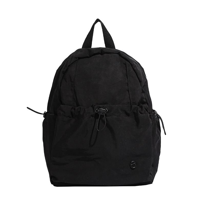 Mochila escolar de gran capacidad para estudiantes de primaria, color sólido simple, mochila casual ligera para niños y niñas 2025 nueva mochila para niños