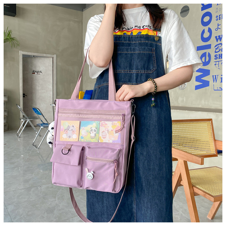 Large-capacity Japanese-style single-shoulder canvas bag for girls, versatile crossbody, ins, a tote bag for junior high school students' classes, and a schoolbag for after-school tutoring undefined