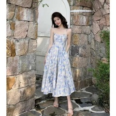 六六フランスの青い油絵のロングスカートのビーチのスカートの花のガーターのワンピースの女性の夏の仙気の質感の高級感