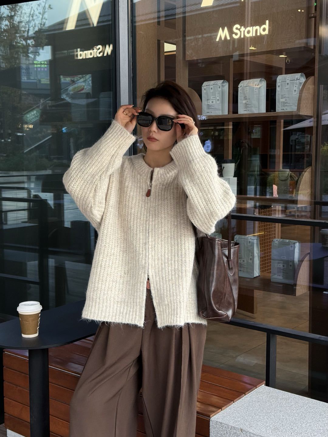 24 invierno Puyuan etiqueta de piel con cremallera de lana cardigan Europa y América ropa de mujer al por mayor nuevo estilo francés cuello redondo