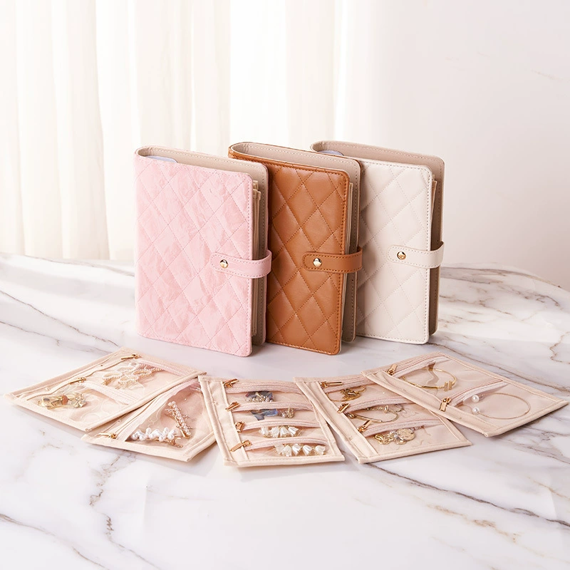 Новая сумка-органайзер для украшений в стиле книги для хранения ожерелий, серег, пусет и аксессуаров, с откидными листами для удобства в путешествиях.