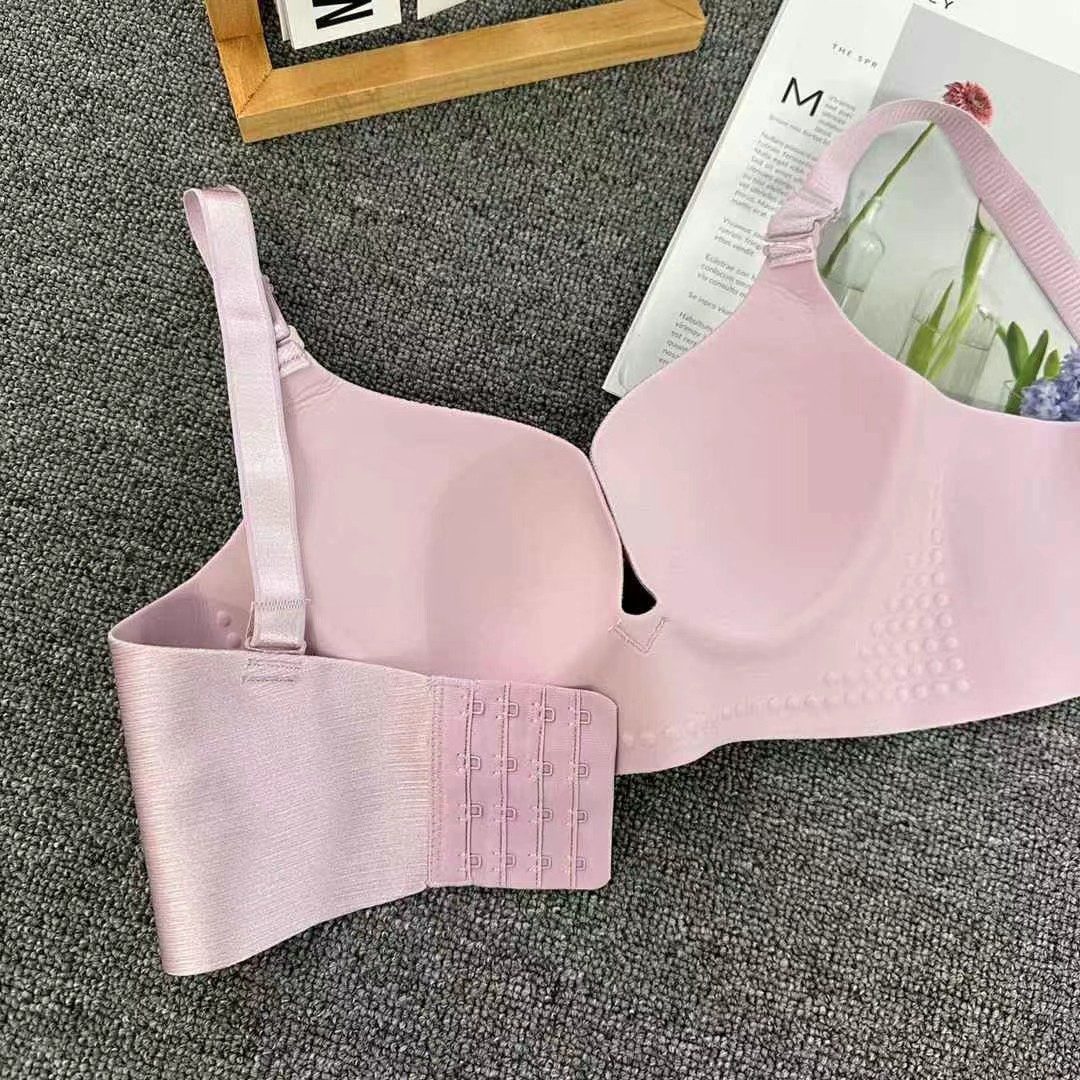 Inventario de bajo costo de sujetador de una pieza para mujer de alta calidad, sujetador de copa fina brillante cepillado, sujetador sin costuras para mujer