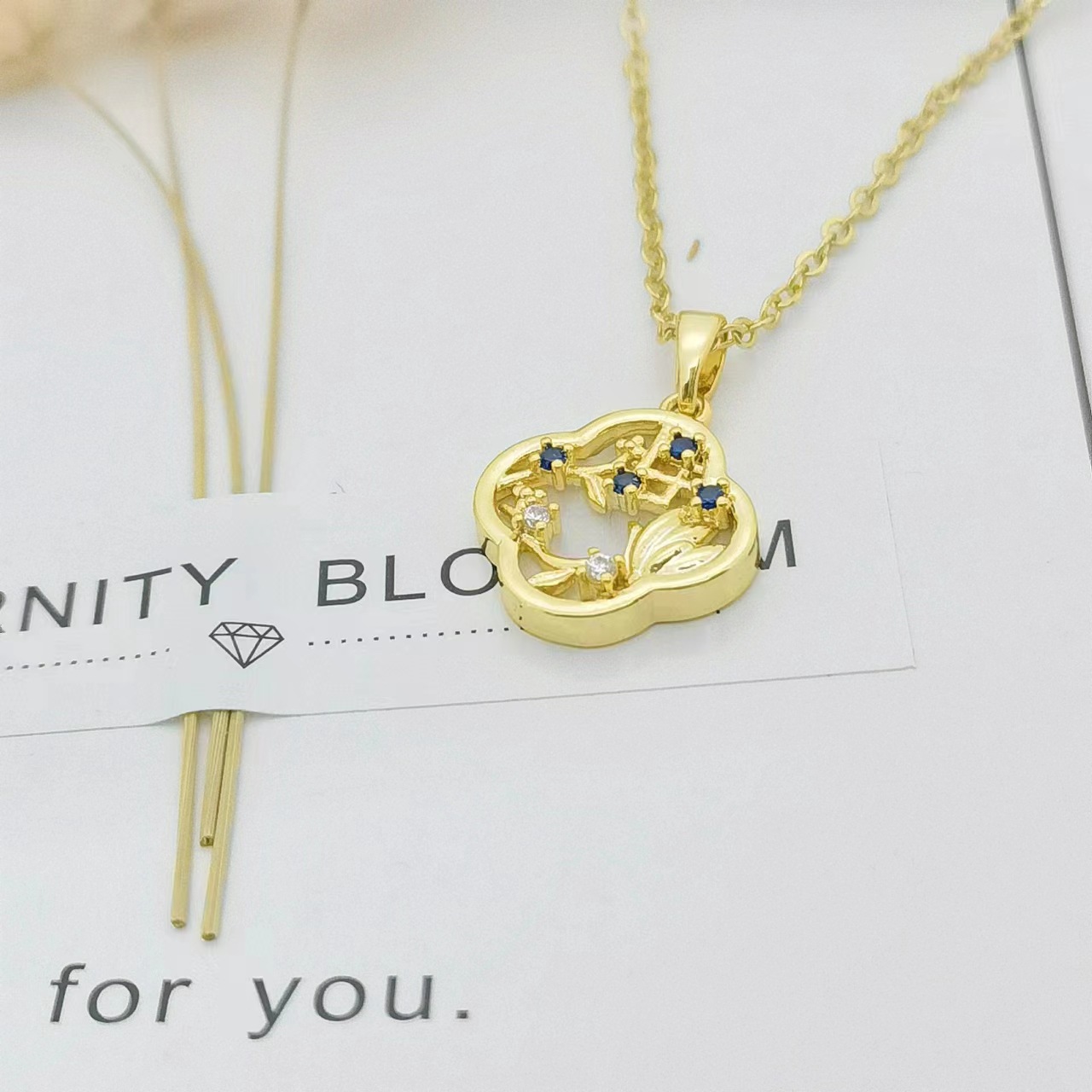 Ig Style Bamboo Flower Fish Tail Titanium Steel 18k Gold Plated Pearl Zircon Pendant Necklace In Bulk display picture 1