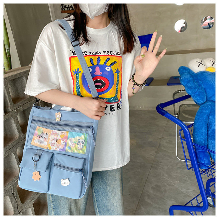 Large-capacity Japanese-style single-shoulder canvas bag for girls, versatile crossbody, ins, a tote bag for junior high school students' classes, and a schoolbag for after-school tutoring undefined