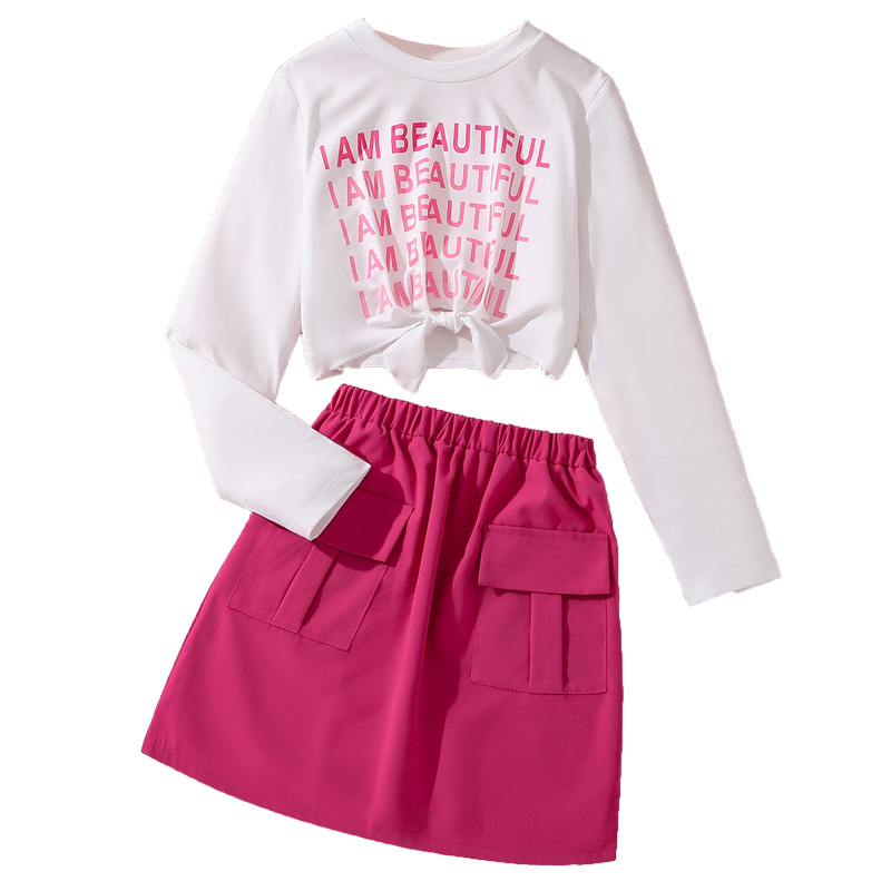 Conjunto de dos piezas para niñas, ropa infantil europea y americana, primavera 2025, nuevo conjunto elegante con estampado de letras, top de manga larga y falda.