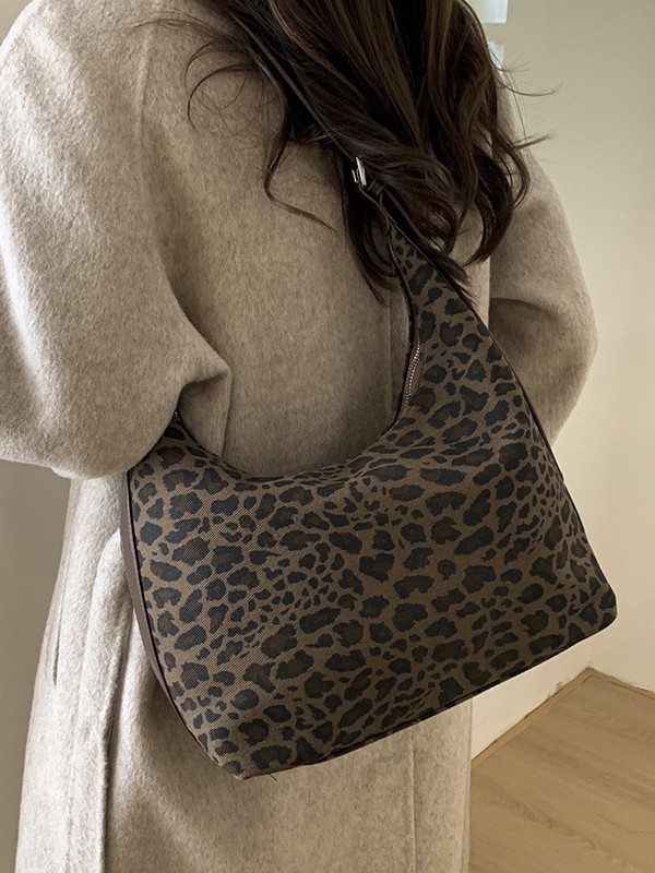 Cross-border 2025 otoño nuevo nicho de diseño brazalete texturas avanzadas retro leopardo viaje mochila de hombro