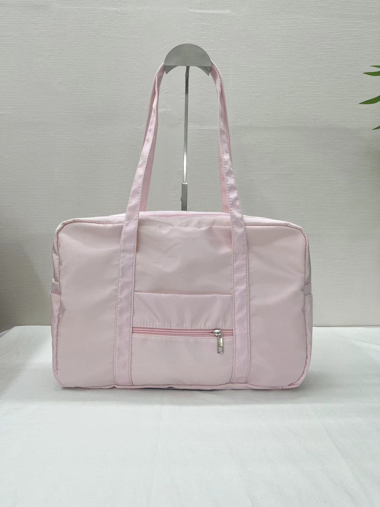 Bolso rosa Tote Bolso de viaje portátil de gran capacidad Bolso deportivo portátil Bolso de equipaje de gran valor de estilo occidental de corta distancia