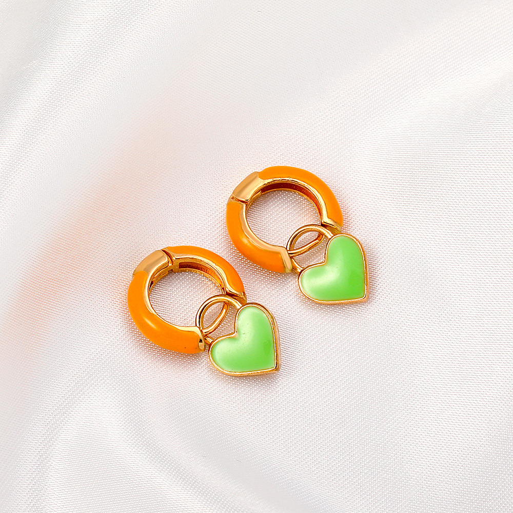 European And American Fashion Colorful Geometric Earrings Simple Alloy Dripping Heart Ear Clip Ins Cold Style Peach Heart Stud Earring Women display picture 6