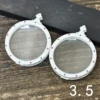 5 silver, double-sided, with gem