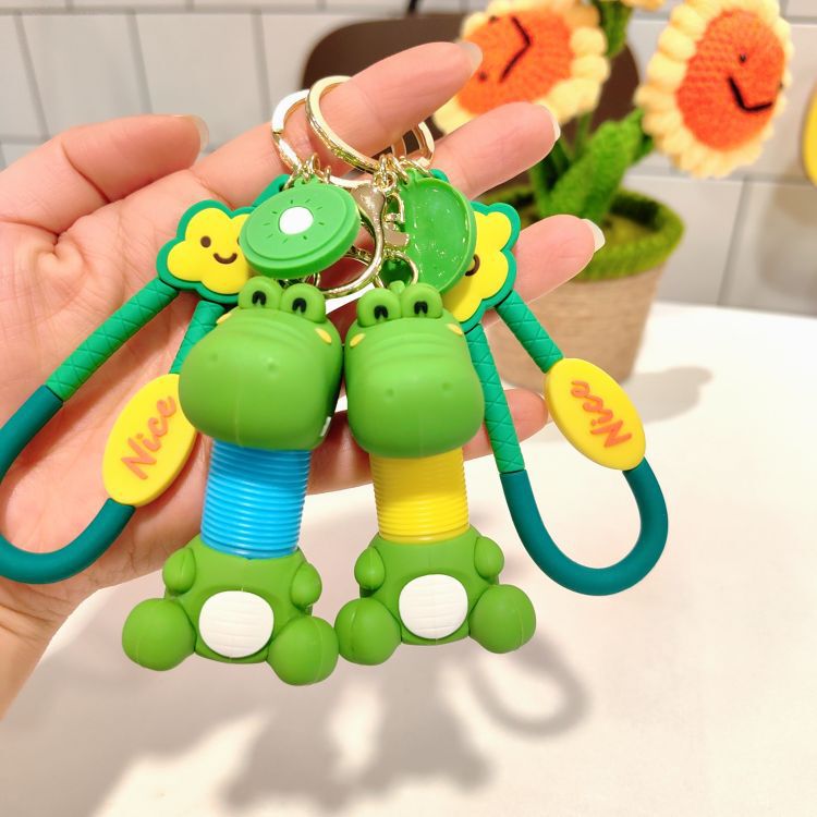 Creative retractable neck little dinosaur keychain pendant Cartoon Doll fun decompression key chain small gift wholesale