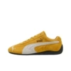 Yellow and white racing shoes