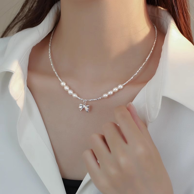 s990纯银碎银几两在逃公主蝴蝶结项链女 轻奢碎银子珍珠锁骨链女