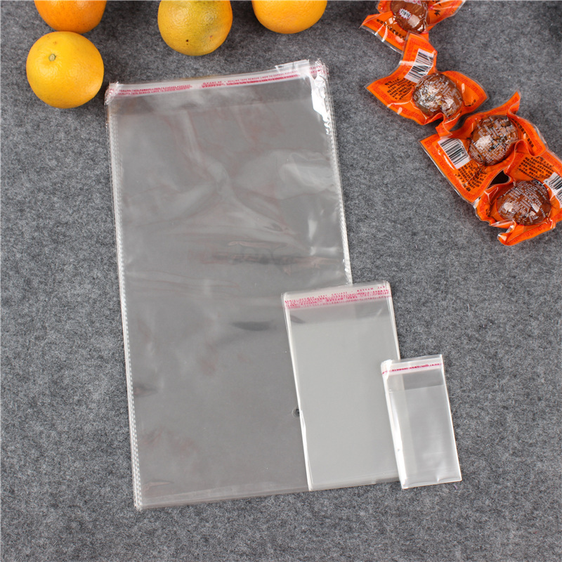55*78opp自粘袋透明包装袋塑料袋服装袋食品袋批发订100