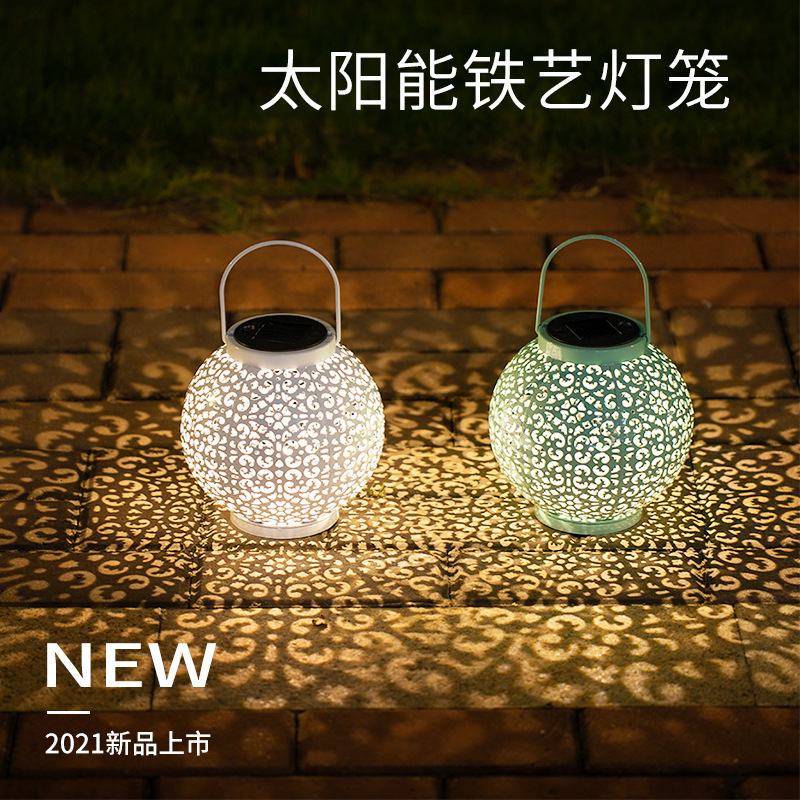 Outdoor decorative solar-powered waterproof wrought iron openwork lantern for courtyard gardens, balcony handheld night table pendant lights