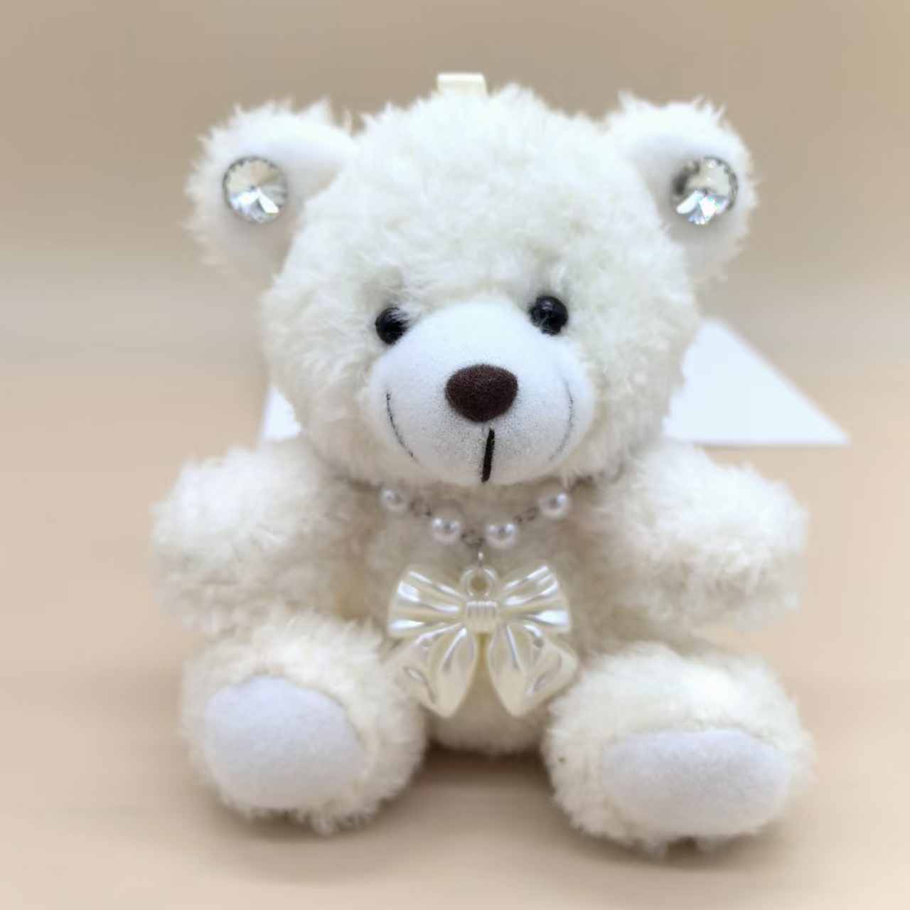 Versión coreana de Dongdaemun con la misma letra de amor dibujos animados oso de peluche muñeco de peluche bolso de muñeca colgante al por mayor