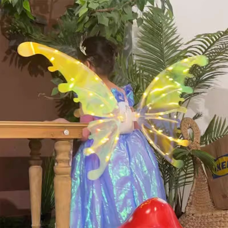 El genio de las alas luminosas eléctricas totalmente automáticas luminosas se moverán mariposa accesorios de espalda con lámpara juguetes para niños y niñas