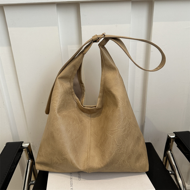 2025 primavera nueva moda bolsos de mano de hombro de gran capacidad bolsos tote bolsos de mujer bolsos de viaje bolsos versátiles para mujeres