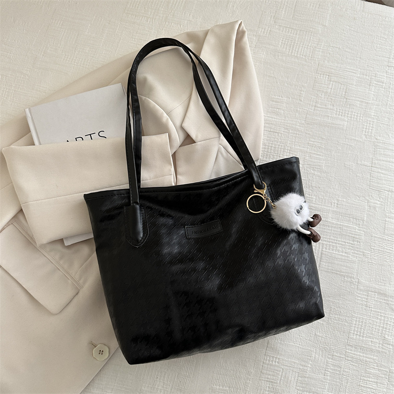 Bolso de mano de viaje al trabajo 2024 primavera nuevo bolso de ocio universal bolso de hombro brazo bolso de mano coreano