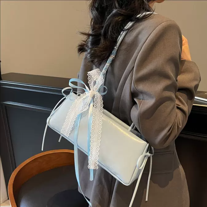 高级质感ins风法棍包女2025新款小众百搭单肩包粉色蝴蝶结腋下包