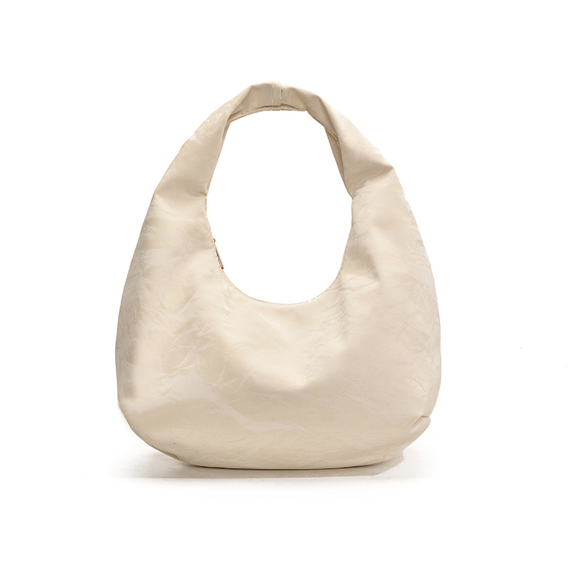 Bolso de mano plegado para mujeres 2025 primavera y verano nuevo nicho de moda bolso de hombro pequeño bolso de media luna fresco