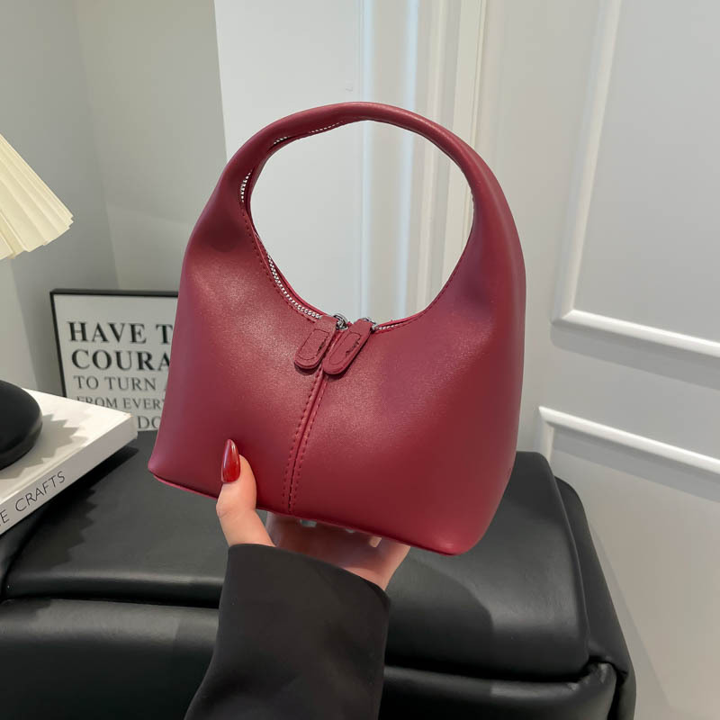 Bolso de diseño de nicho Tide2025 nuevo bolso de mano encantador para mujeres texturas retro versátiles bolso de mano
