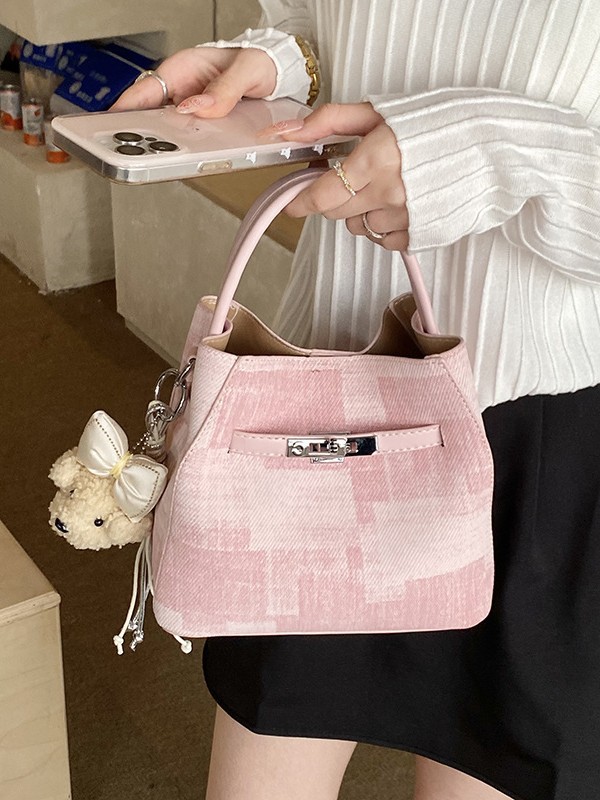 Comercio exterior transfronterizo coreano simple nicho de diseño de moda bolso de cubo para mujeres 2026 nuevo tipo de mujer mochila de hombro