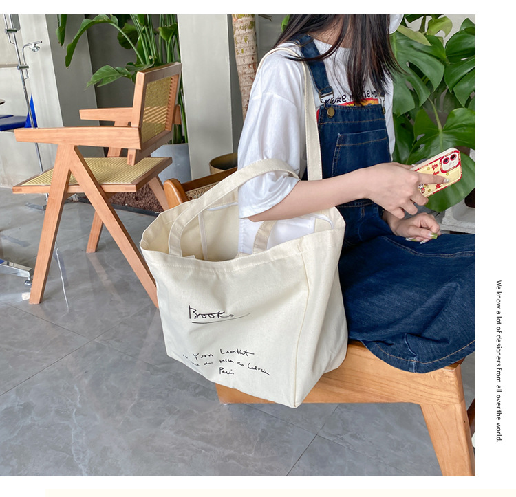 A large-capacity, sturdy Japanese-style canvas bag for women, a new 2022 simple bento handbag for girls to go to work undefined