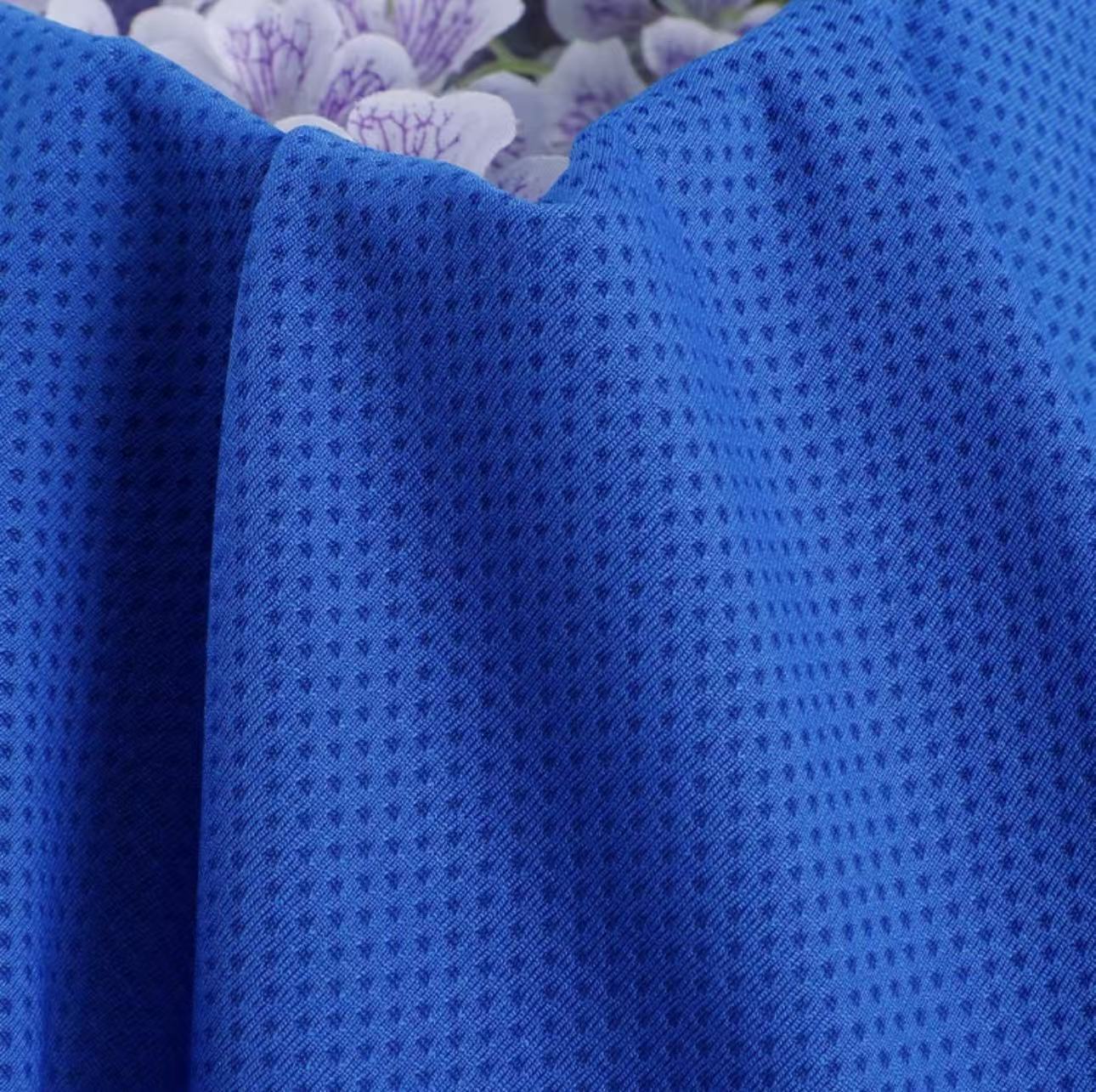 Spot Shuangyi.com Promoción especial poliéster absorbente de humedad rápida secado deportivo tela de malla Jacquard panal