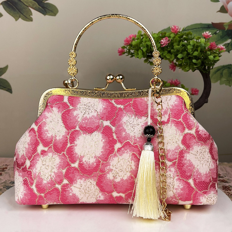 新製品のシンプルなチャイナドレスのカバンを斜めに掛けて三用のハンドバッグを使ってクロスボーダーの女性バッグを持っています。|undefined