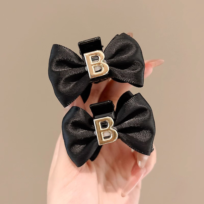 Clips de agarre de arco negro pequeño para mujeres frente retro clips de bangs 2025 nuevo clips de cabello princesa accesorios para el cabello