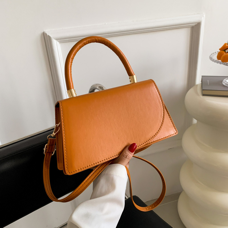 ESTILO OCCIDENTAL con textura pequeña bolsa para las mujeres 2024 Nuevo este año popular de color sólido bolsa de mensajero de moda portátil pequeña bolsa cuadrada de moda