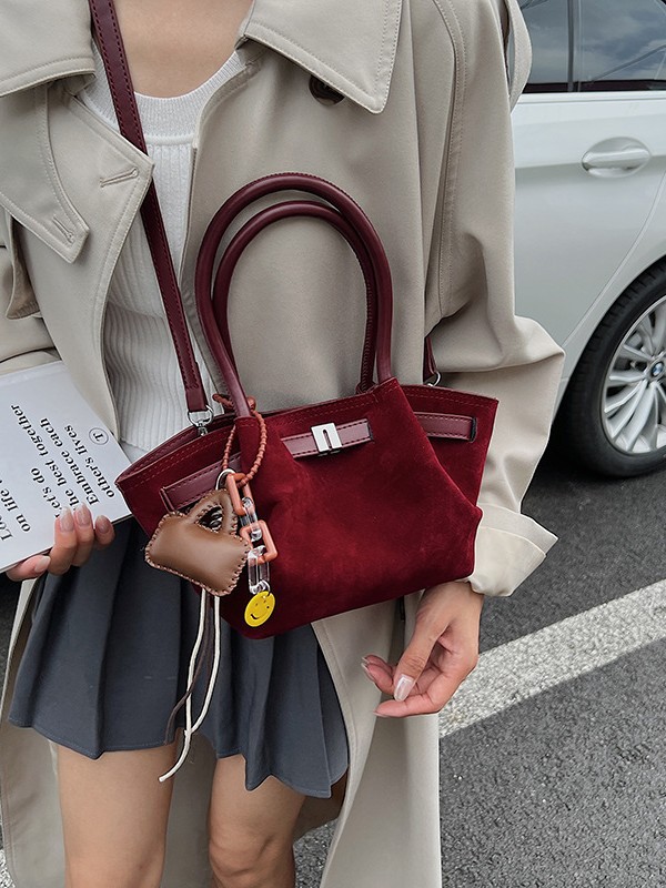 Cestas de platos de mano bolsas de cubo mujeres 2025 nuevo cross-border europeo y americano retro mochila de piel de ciervo esmaltado