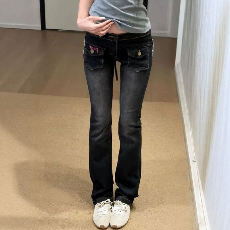 American-style Y2K hot girl jeans with back straps, featuring a wing print, low waist, slim fit, and a slightly flared leg American-style Y2K hot girl jeans with back straps, featuring a wing print, low waist, slim fit, and a slightly flared leg