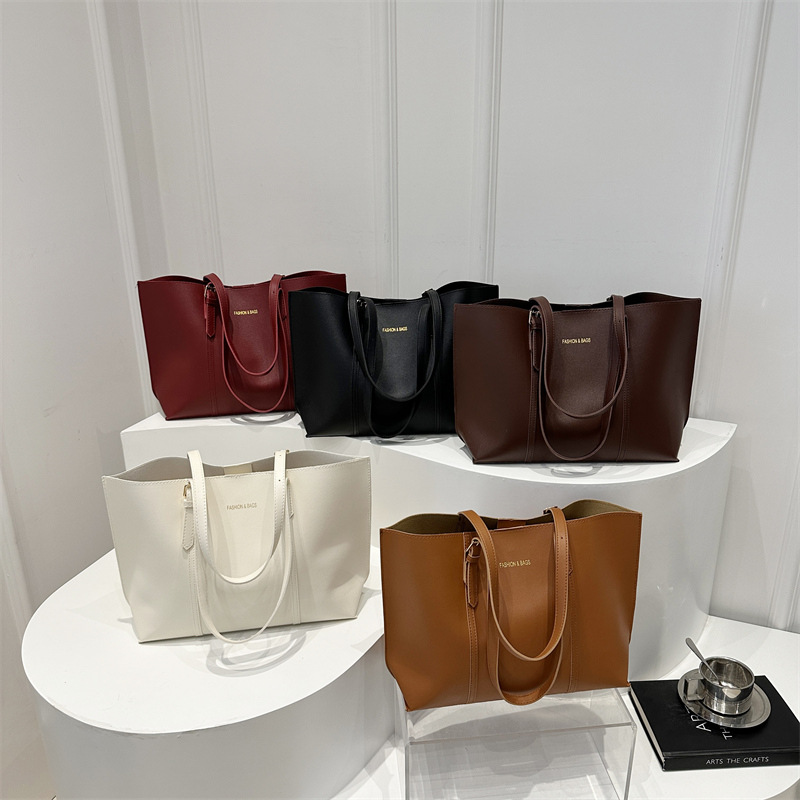 Bolsa de invierno nueva 2024 este año popular de viaje al trabajo bolsa de hombro simple bolsa de brazo retro