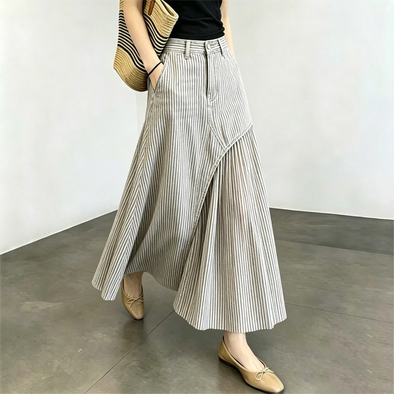 Awesome product, absolutely stunning! Women's summer design high-waisted slimming A-line long skirt with irregular vertical stripes