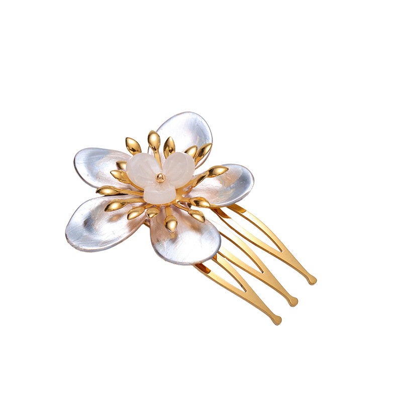 TENA Europa y los Estados Unidos transfronterizos tulipanes dorados flores de peinado cráneo alto universal accesorios de pelo de viajeros mujeres al por mayor
