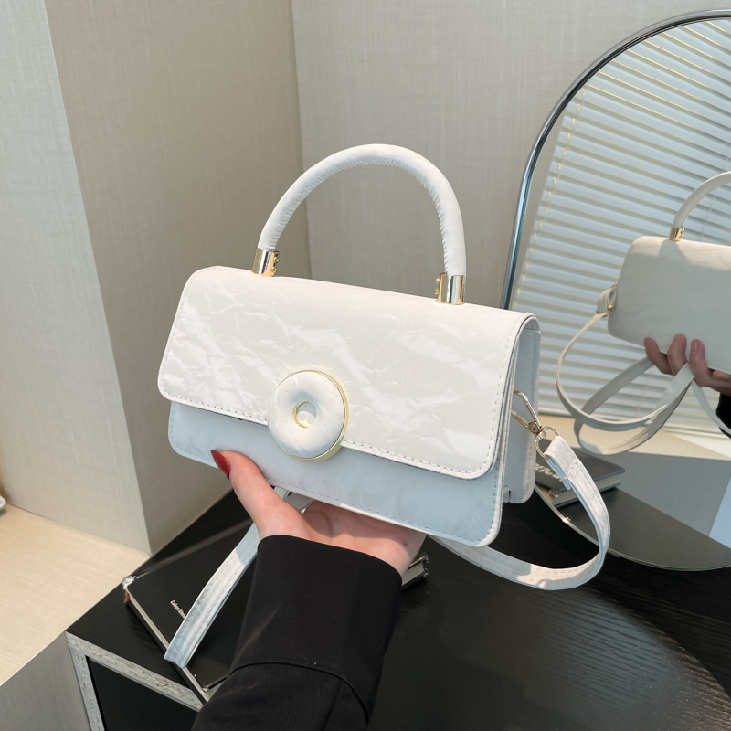 Textura de empalme artístico simple bolso cuadrado 2024 ocio nuevo estilo de invierno personalidad extranjera bolso de hombro portátil