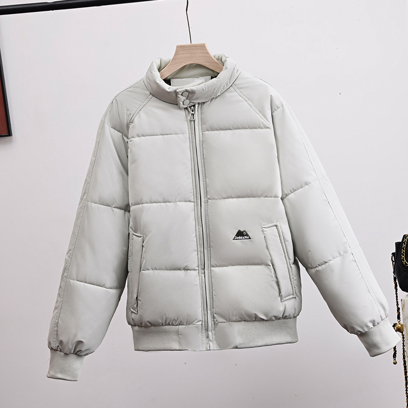 Nuevo estilo de invierno coreano suelto de cuello de pie ropa de pan pareja engrosada de algodón chaqueta de algodón chaqueta de moda para hombres y mujeres