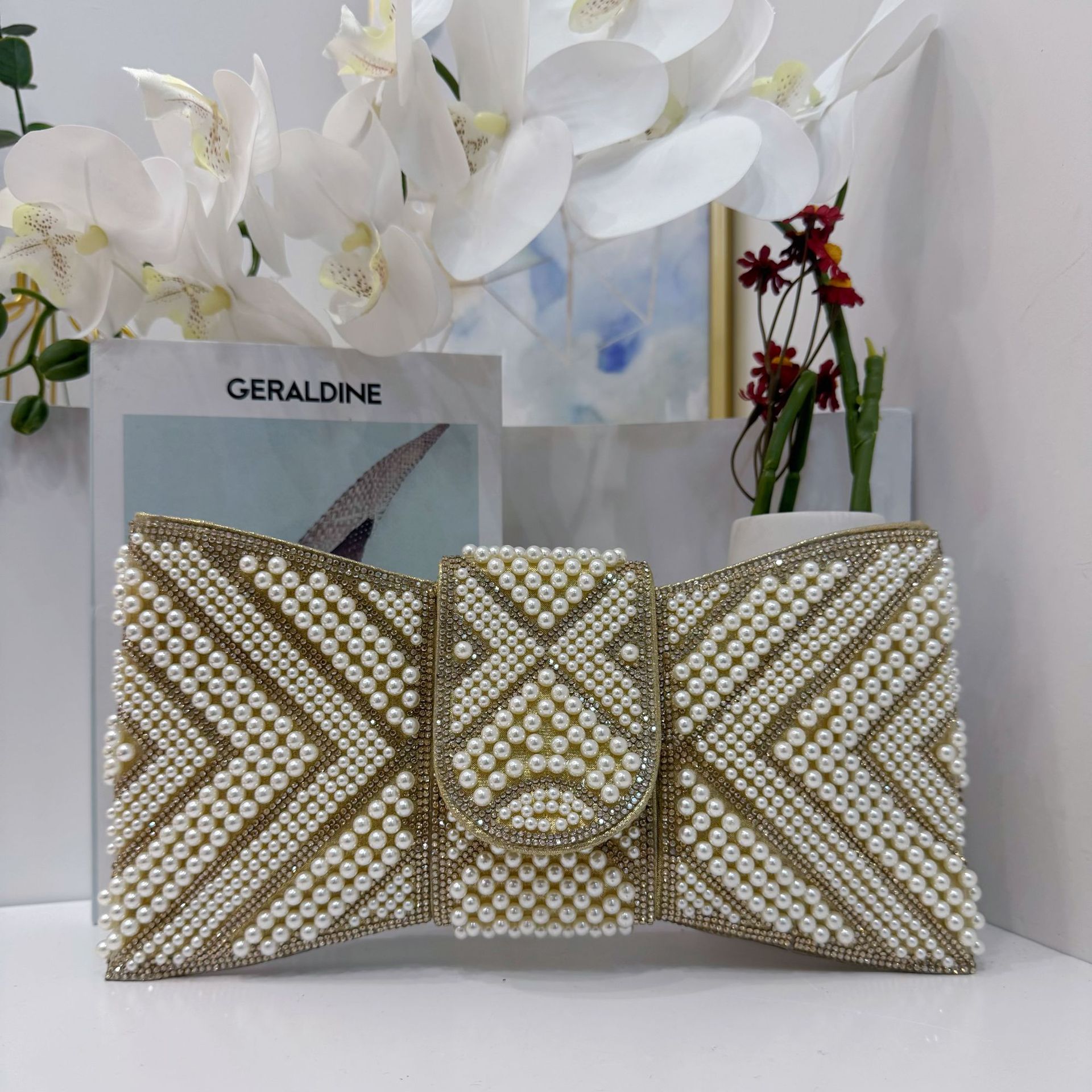 Bolsa de cena de damas transfronterizas, bolsa de mano de lujo ligera, perlas de diamante, bolsa de cena de arco inclinada de hombro único