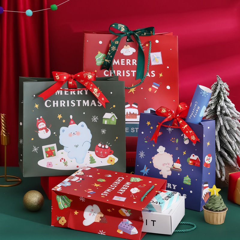 2024新款丝带款圣诞节手提礼品袋平安夜礼物包装袋圣诞卡通手提袋